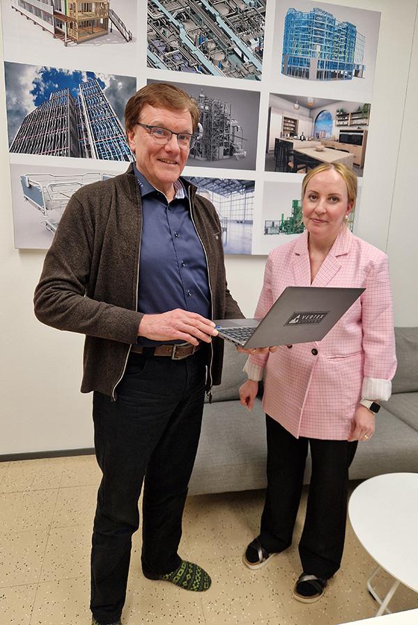 Reijo ja Elina toimistolla Vertexillä